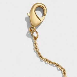 This 2.5" long, 18K gold plated chain extender